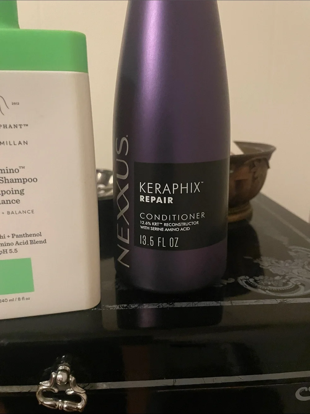 Drunk Elephant Cocomino Glossing Shampoo and Nexxus Keraphix repair